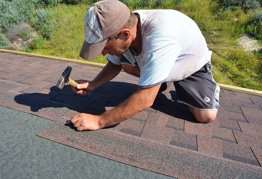 Man on top of roof